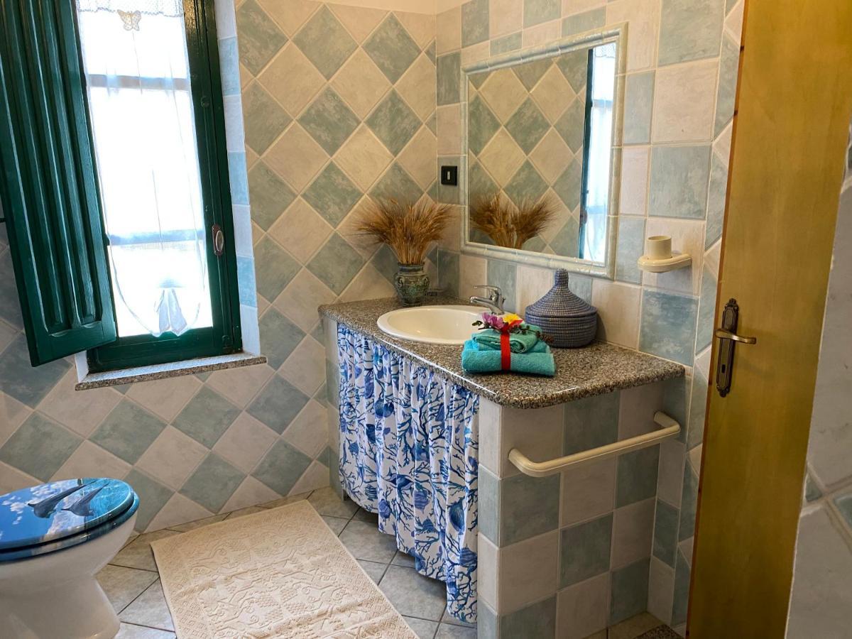 Il Bacio Del Sole Apartment แตร์เตนิอา ภายนอก รูปภาพ